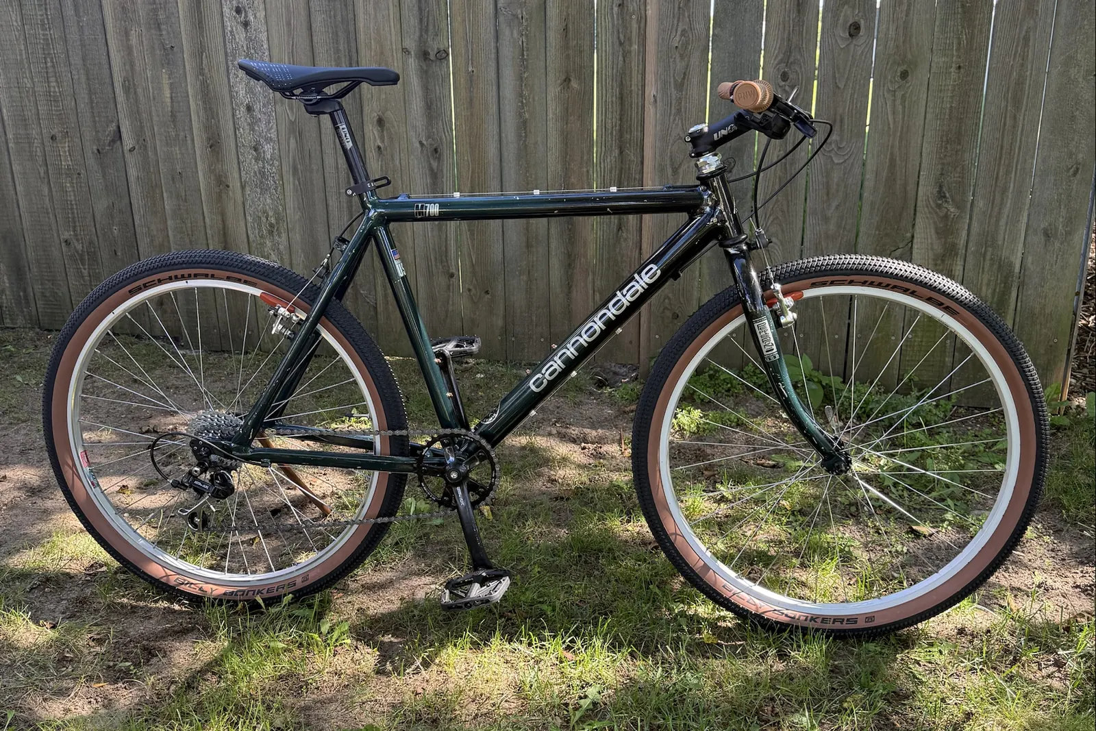 The M700 today: single chainring, tan grips, tan-wall tires, new saddle.