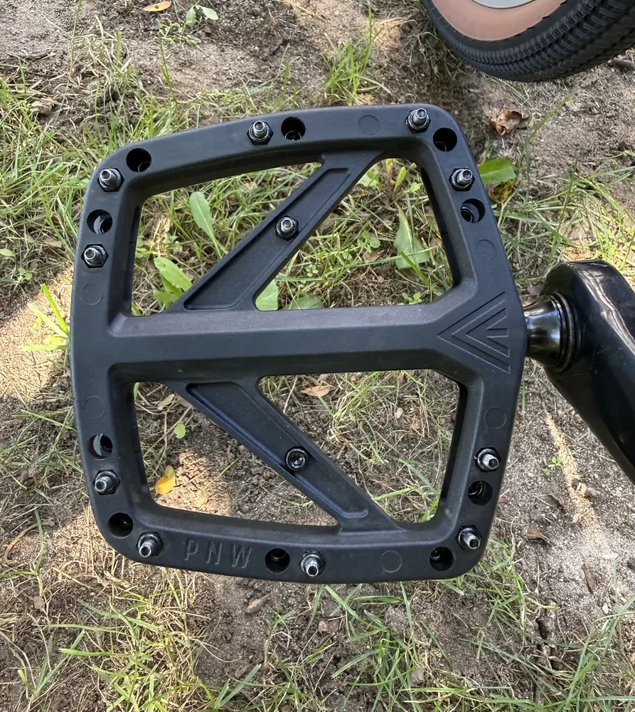 Black PNW Range Composite flat pedal with steel pins.