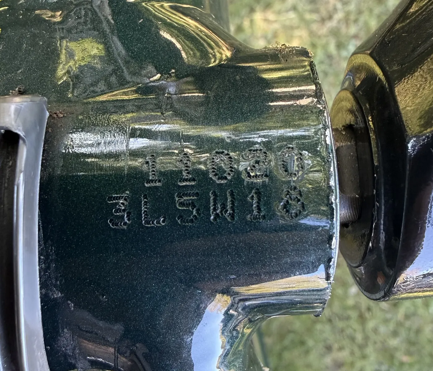 Serial number 11020 over 3L5W18 stamped into the bottom bracket shell, beside the plastic cable guide.