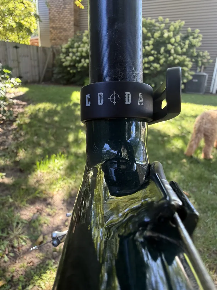 CODA Slim-Cam seatpost clamp with worn lettering.